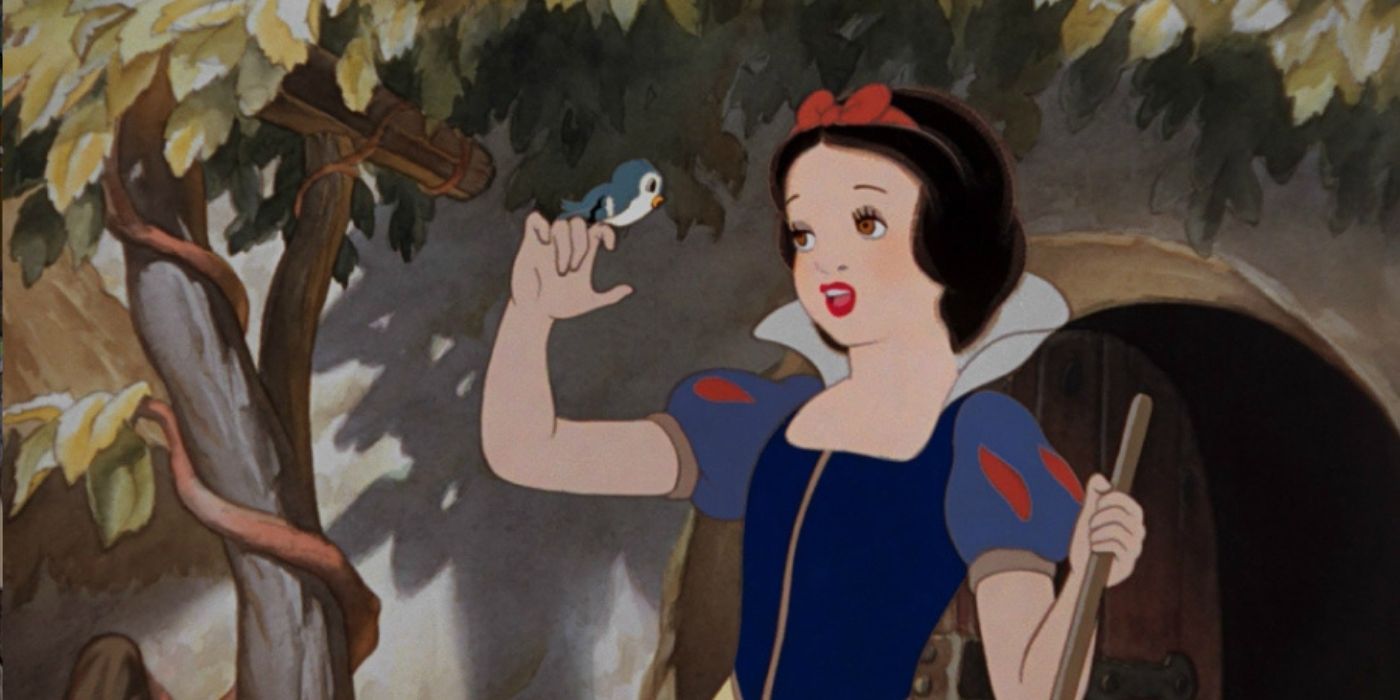 Snow White singing to a bird in Disneys Snow White in the woods hiding with her animals