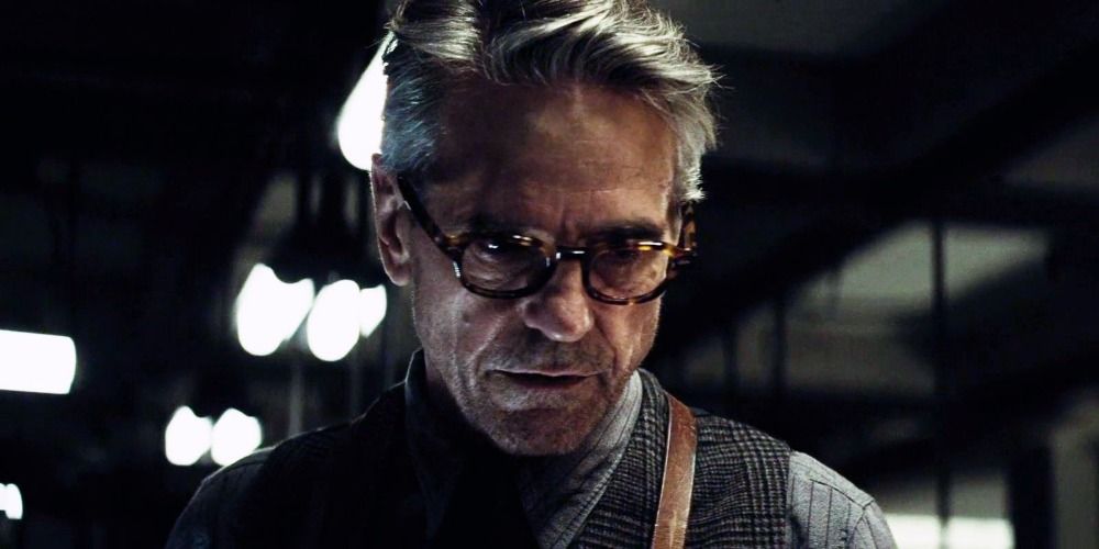 Jeremy Irons as Alfred Pennyworth in the Batcave in Batman v Superman