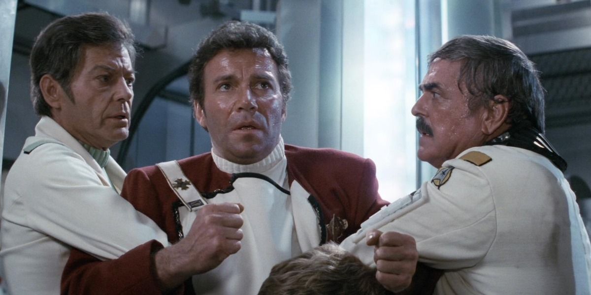 William Shatner DeForrest Kelly and James Doohan as Kirk McCoy and Scotty in The Wrath of Khan.