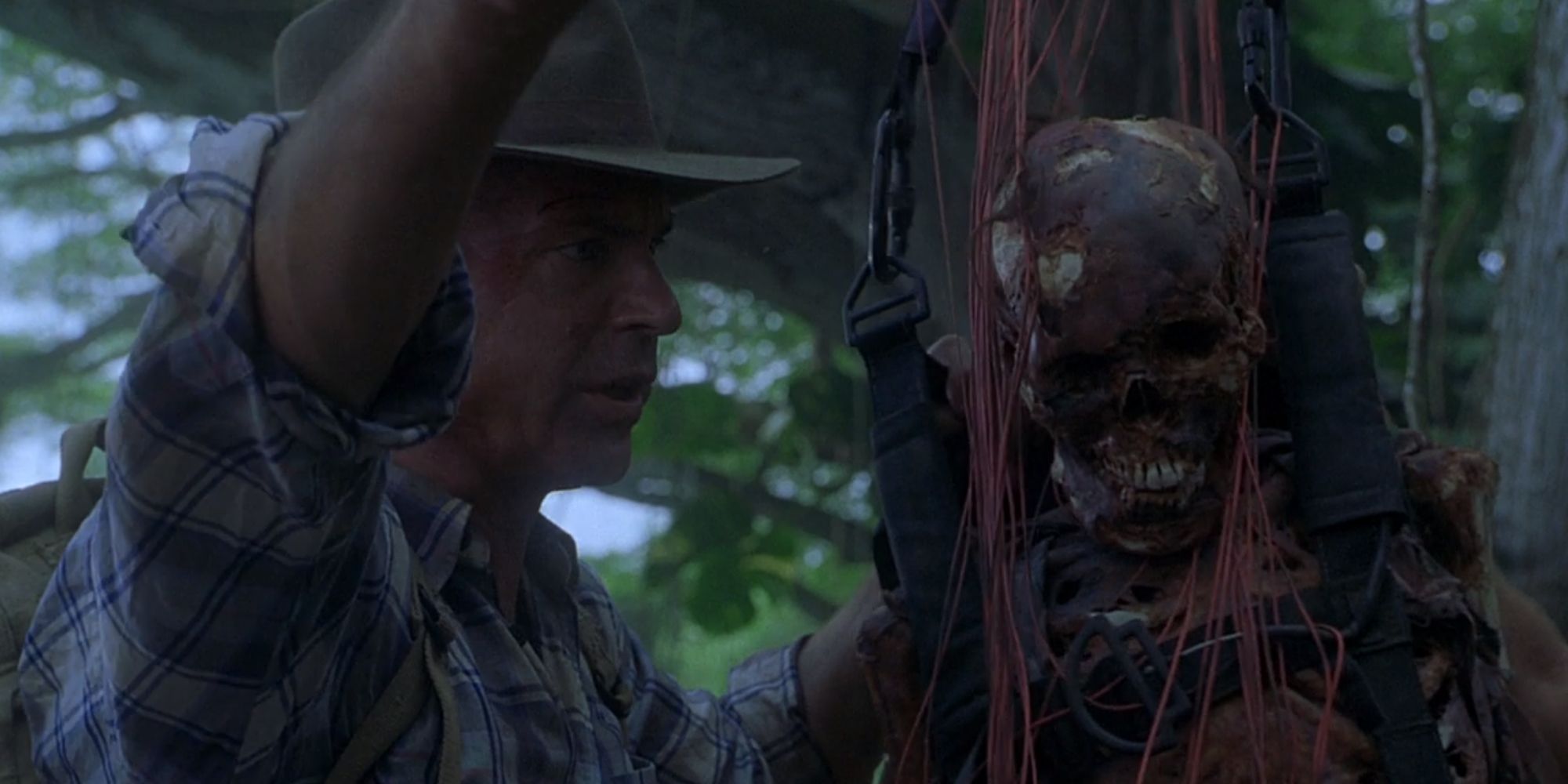 Alan Grant with Ben Hildebrands corpse in Jurassic Park III