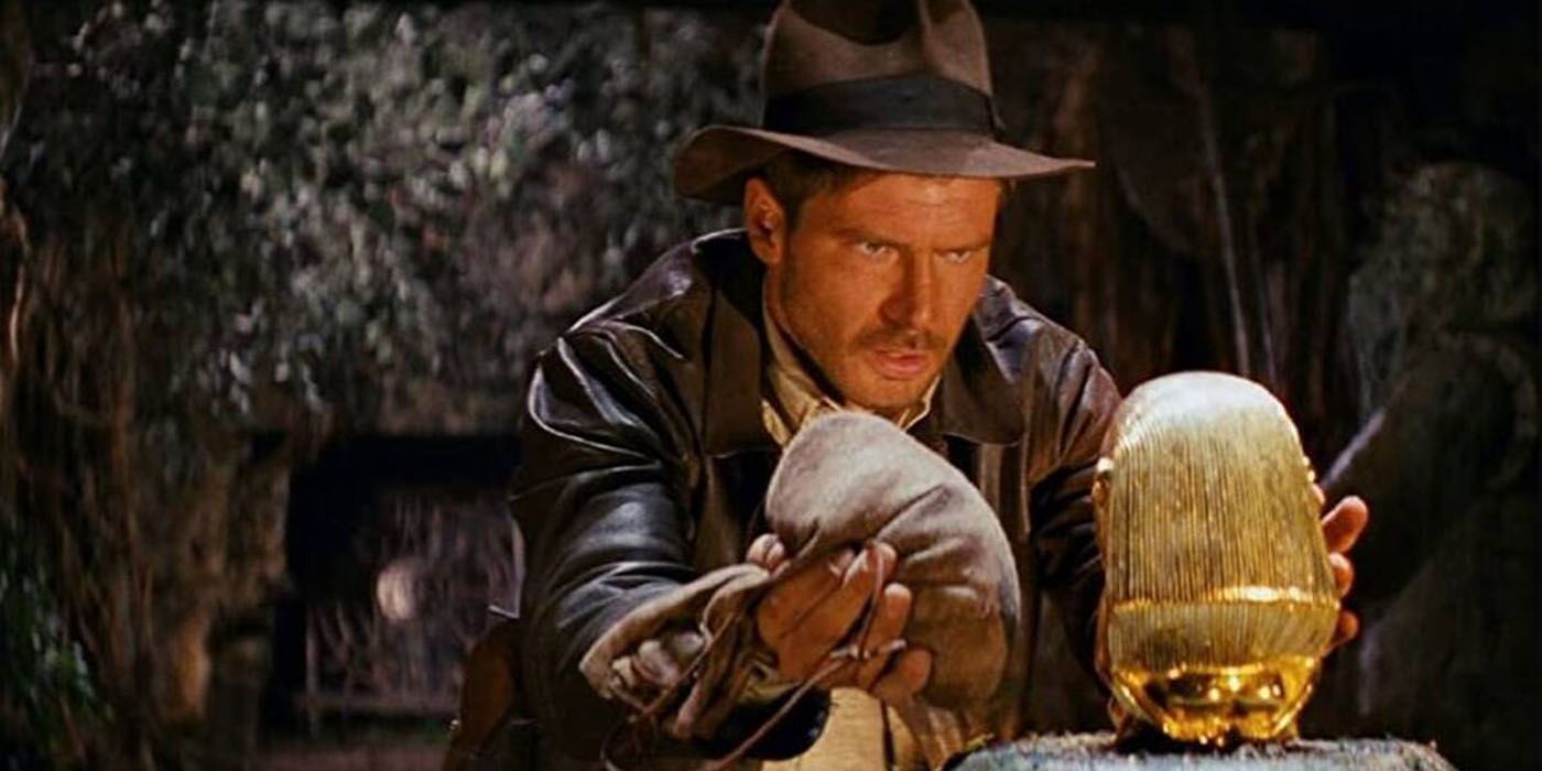 Indiana Jones grabbing tresure in Raiders of the Lost Ark