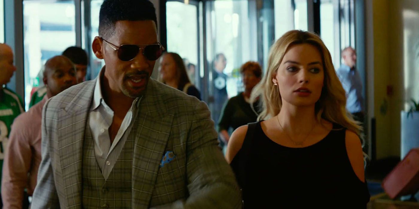 Will Smith walking with Margot Robbie in terminal in Focus