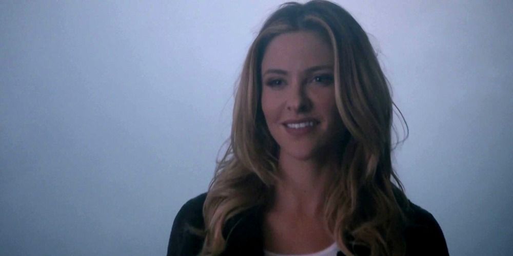 An image of Kate Argent smiling in Teen Wolf