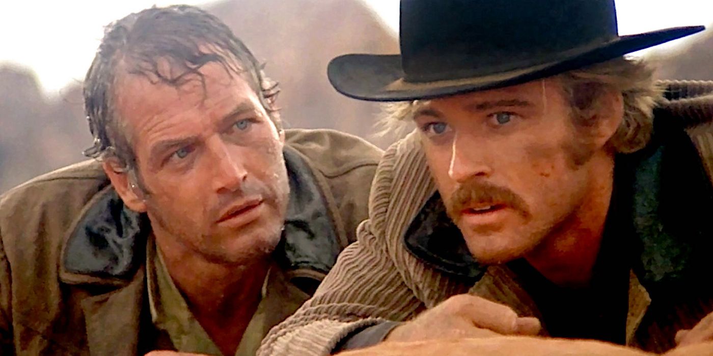 Butch Cassidy and the Sundance Kid watching from a mountain perch