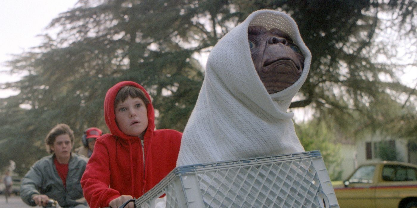 Elliott riding his bike with ET