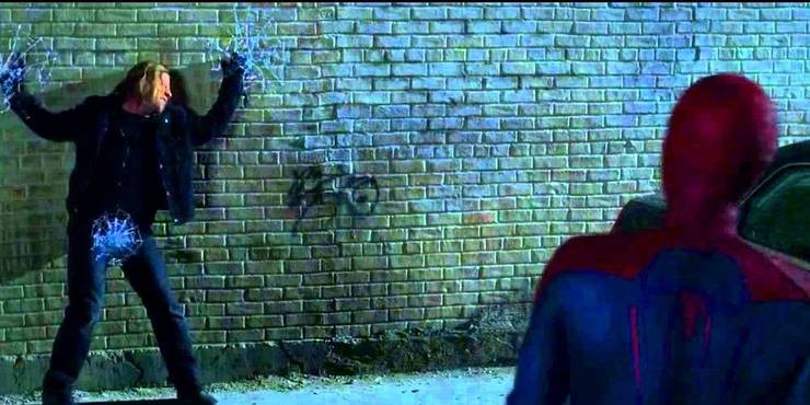 An image of Spider Man pinning a thief to the wall with his webs in The Amazing Spider Man.jpg?q=50&fit=crop&w=740&h=370&dpr=1