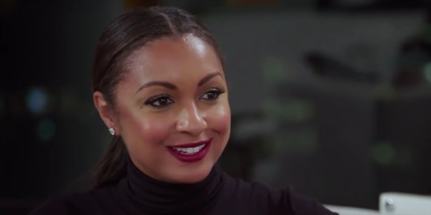 Eboni K Williams smiling in Real Housewives of New York RHONY