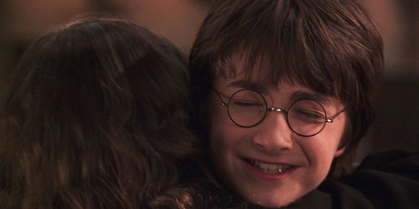 Harry and Hermione hug