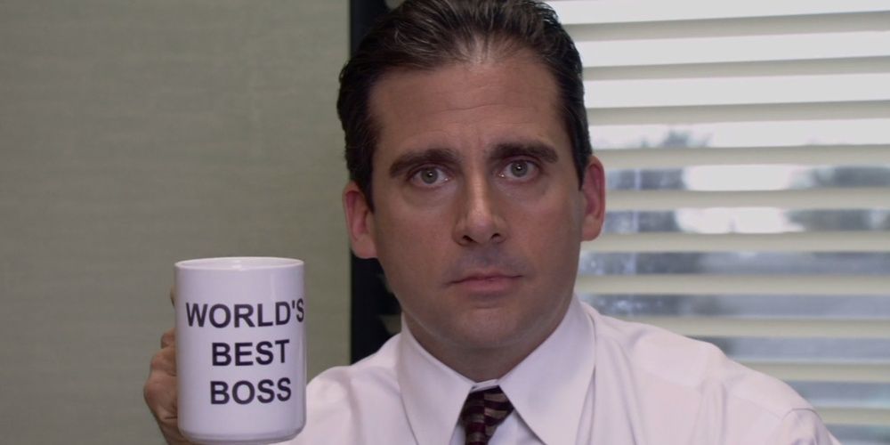 Michael Scott holds up coffee mug in The Office Cropped 1