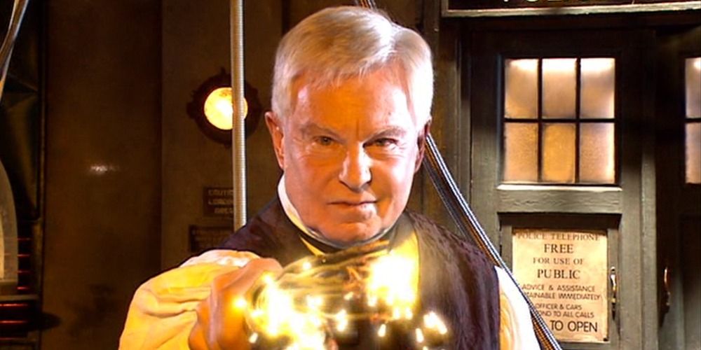An image of Professor Yana holding an electric cable in Doctor Who