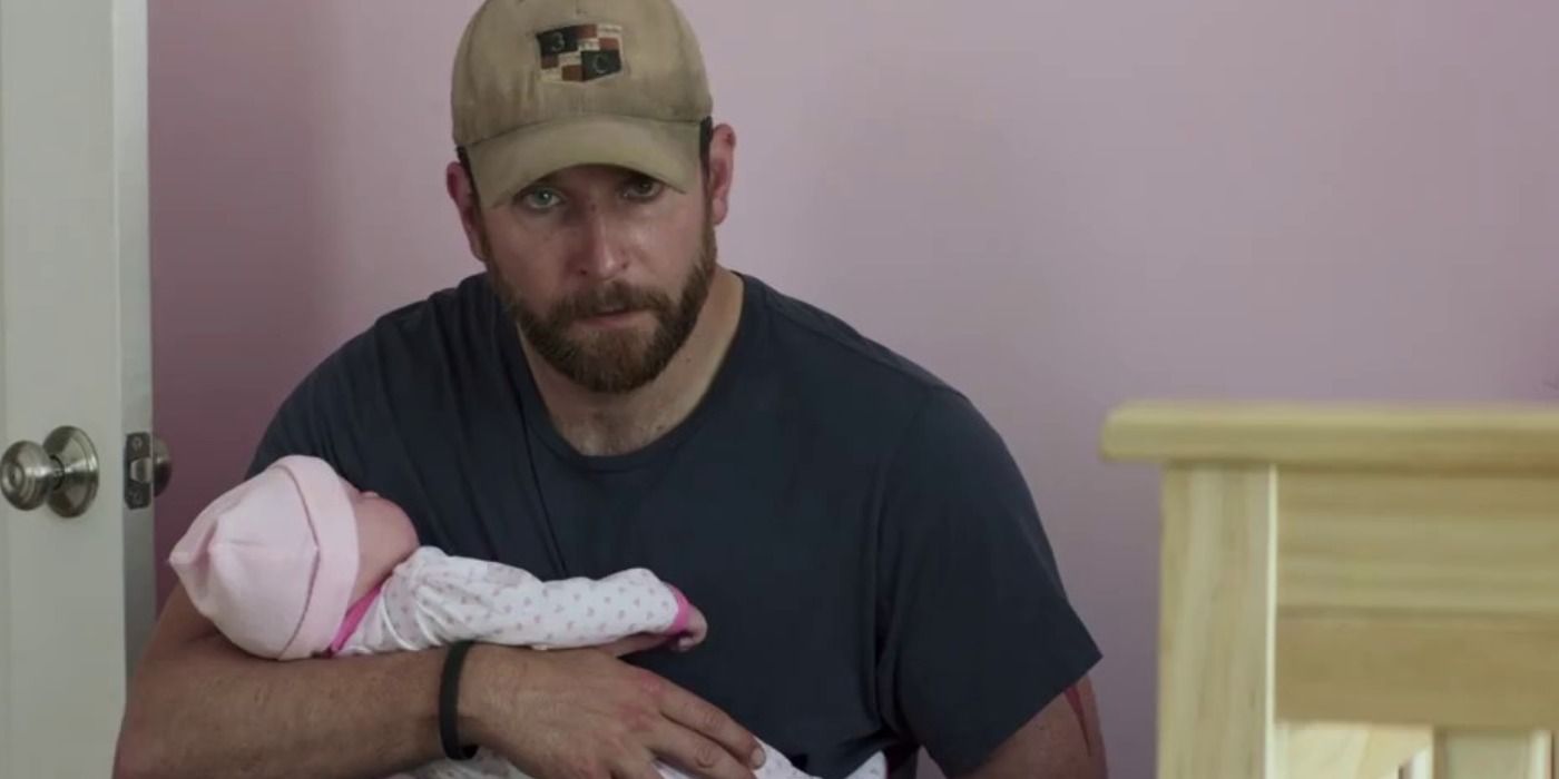 Bradley Cooper holds a fake baby in American Sniper