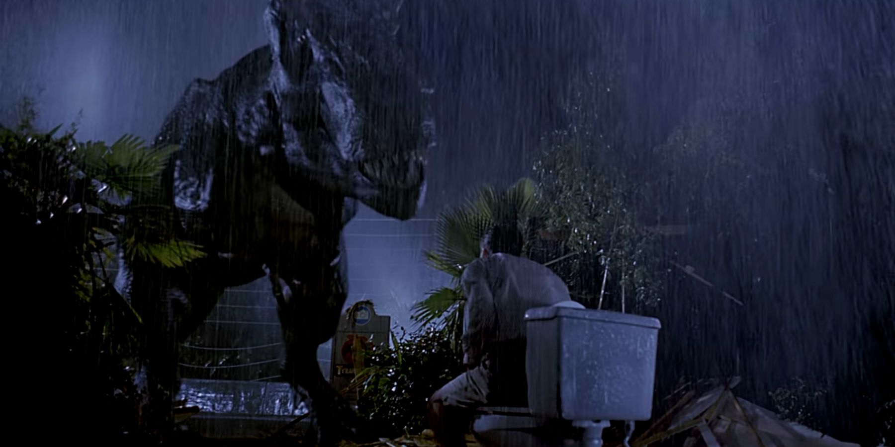 Rexy the T Rex watching Gennaro in Jurassic Park