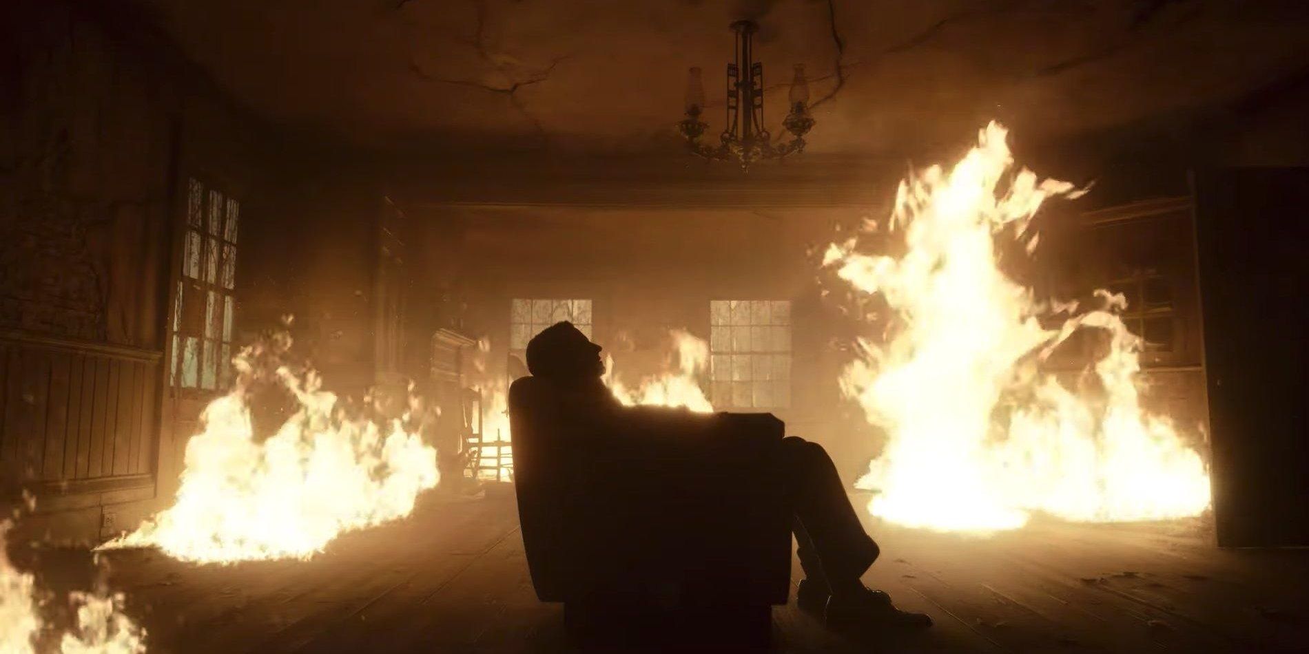 Stan sits in a burning cabin in Nightmare Alley