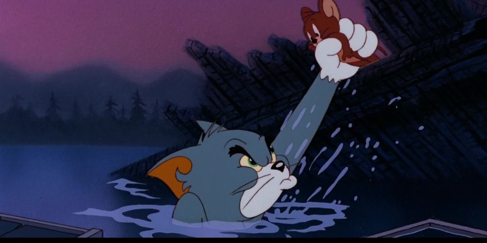 An image of Tom holding Jerry above water
