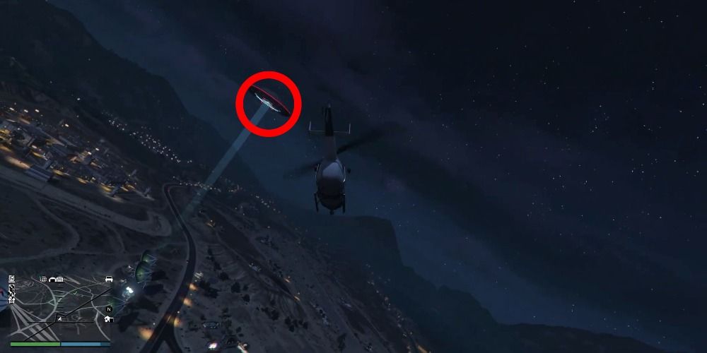 An image of a UFO flying over GTA