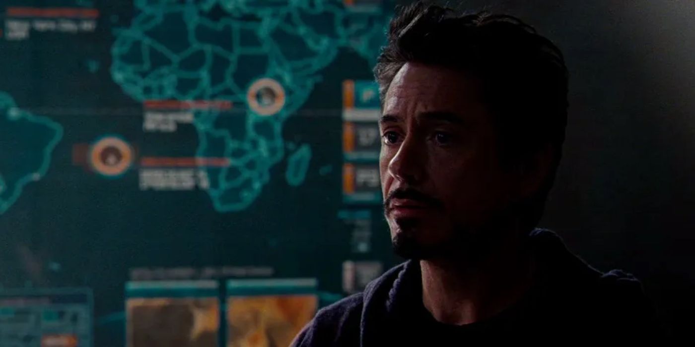 Tony Stark in Iron Man 2 with a map in the background showing Wakanda