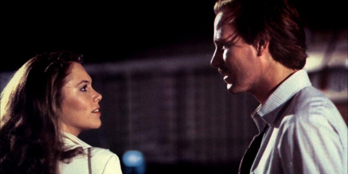 William Hurt with a woman in a parking lot in Body Heat Cropped