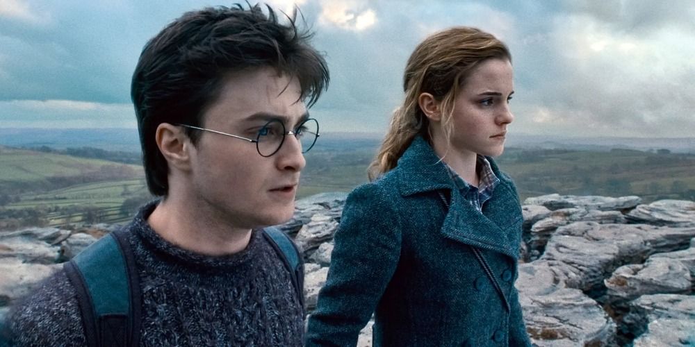 An image of Harry and Hermione standing on a rocky cliff in Harry Potter