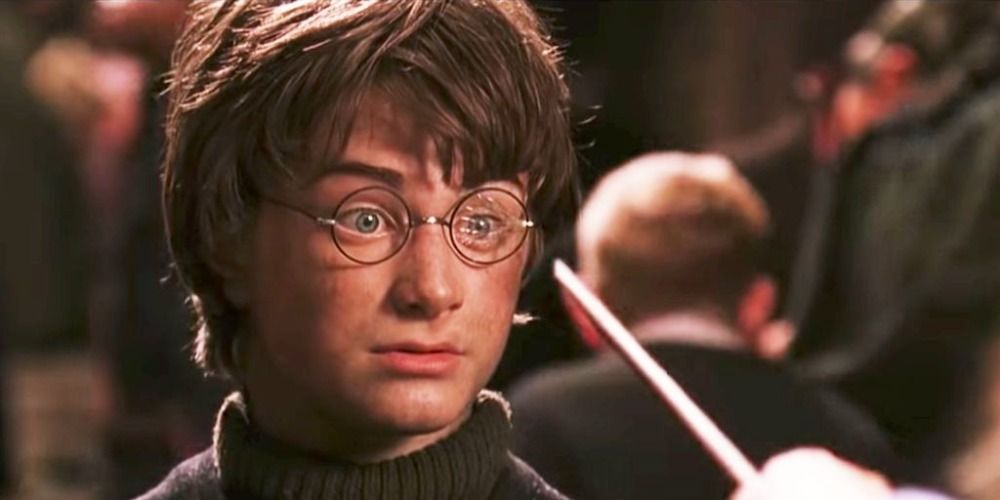 An image of Harry getting his glasses repaired in the Harry Potter movies