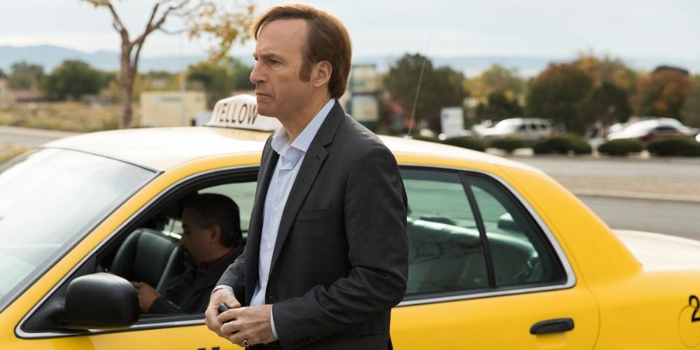 An image of Saul standing outside of a cab in Better Call Saul