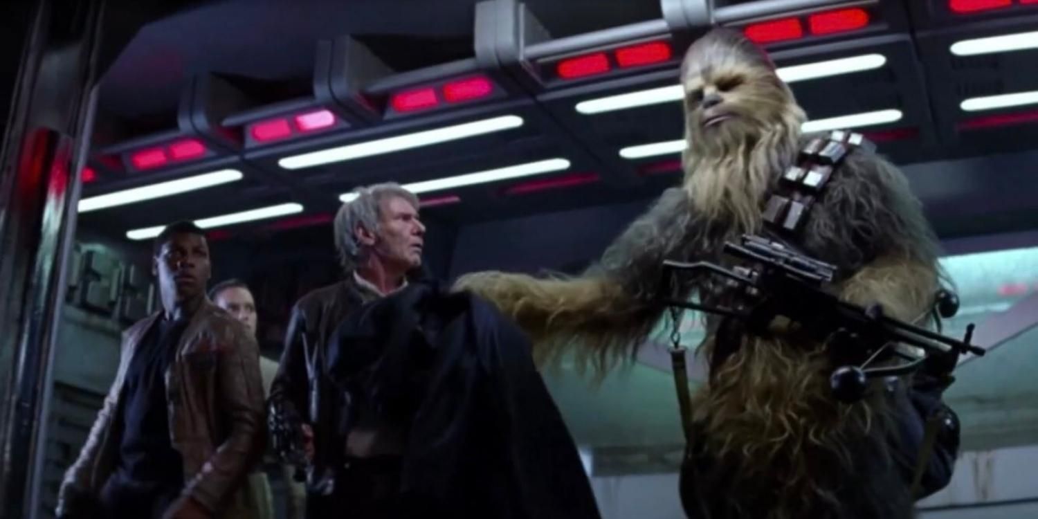 Chewbacca handing Han his parka back in Star Wars The Force Awakens