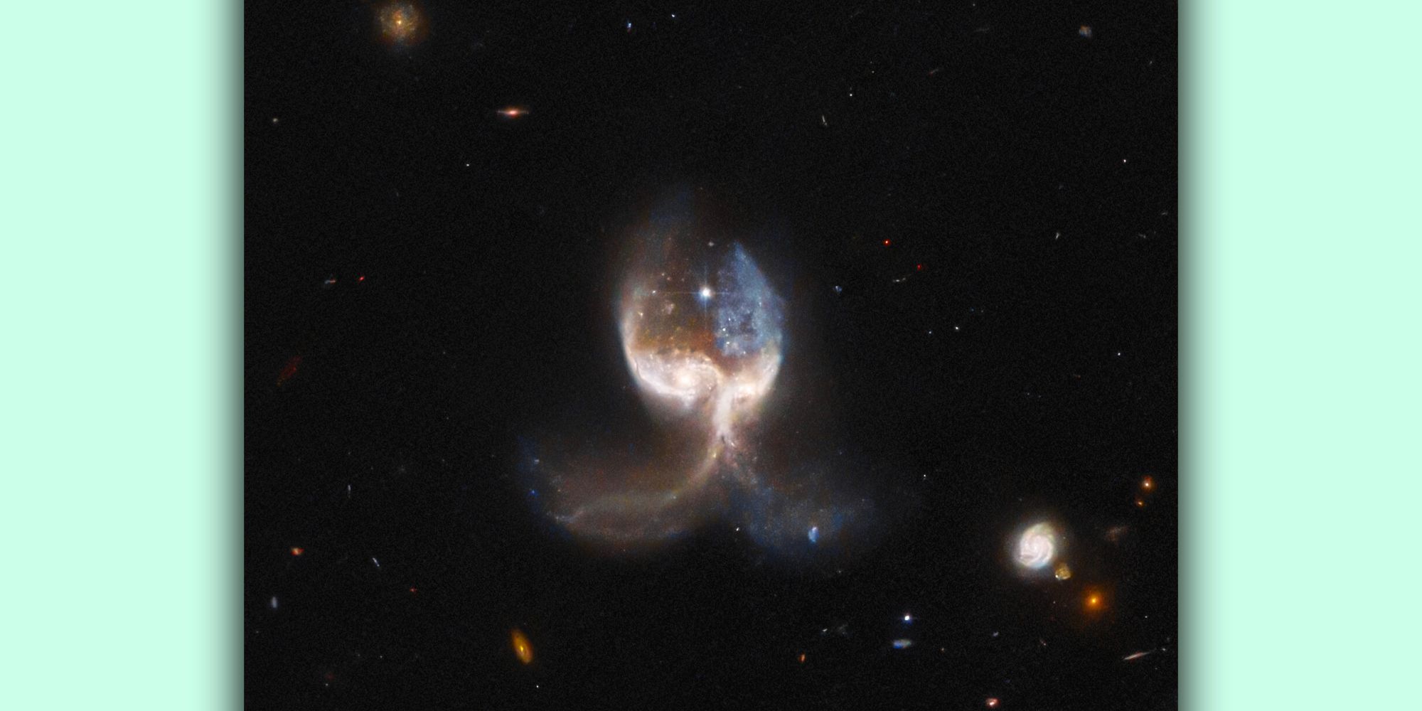 These Merging Galaxies Look Like Massive Wings, And NASA Has A Photo