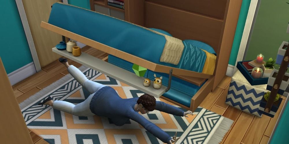 An image of a sim being crushed by a bed in Sims 4