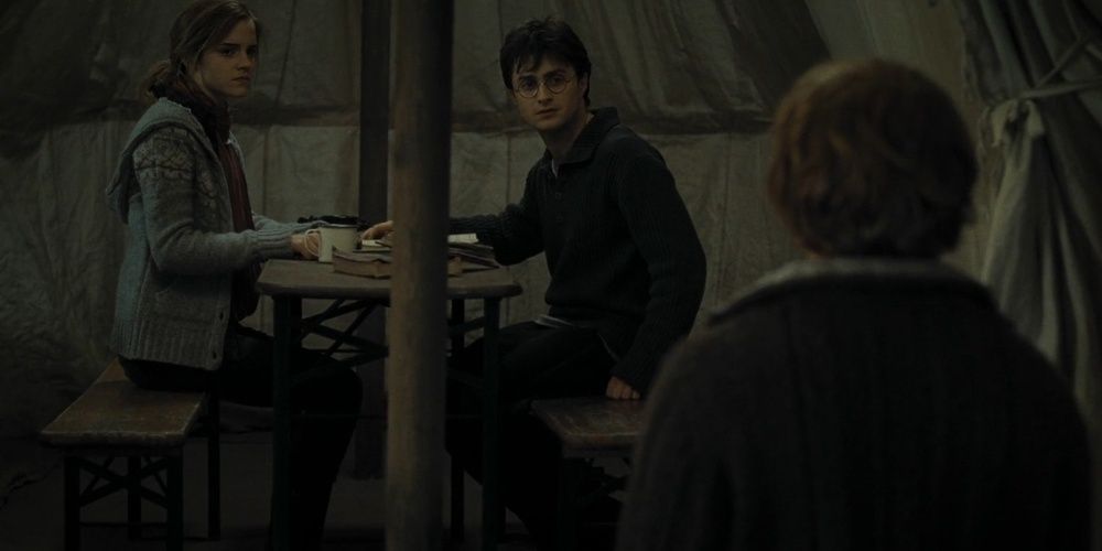 Harry Potter and Hermione looking at Ron in a tent in Deathly Hallows Part 1 Cropped 1