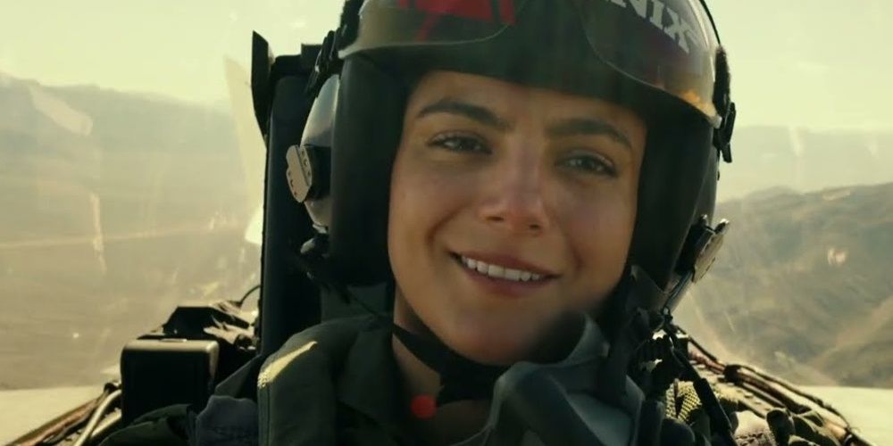 Phoenix smiling while flying a jet in Top Gun Maverick Cropped 1