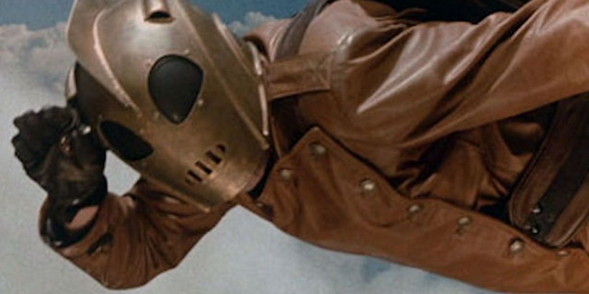 A moment from the movie The Rocketeer with the superhero in flight